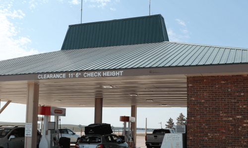 View of the covered gas pumps at the Conoco Gas Station at 1880 Town